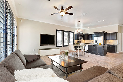 Interior shot of Cullers home showing living room and an open kitchen