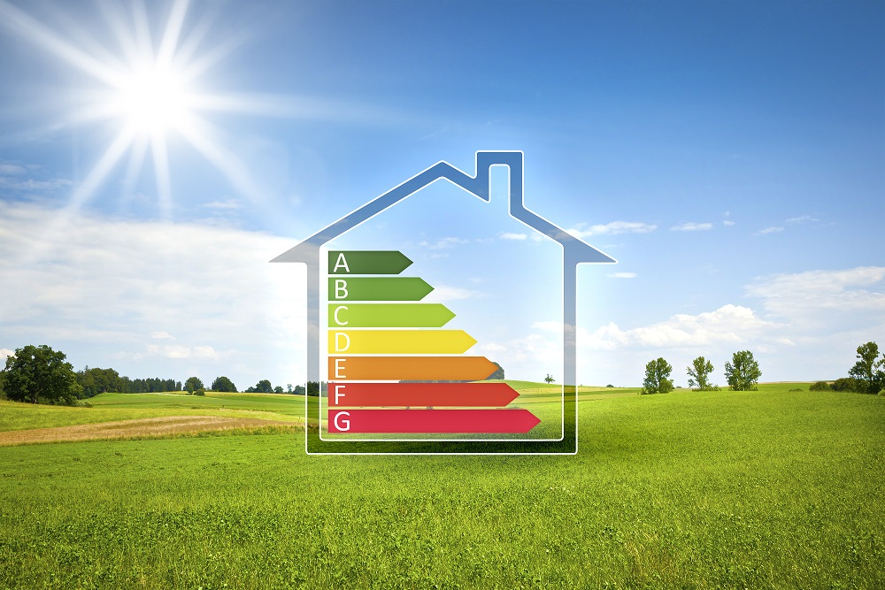 An image of a green house in the sun with energy efficiency graph